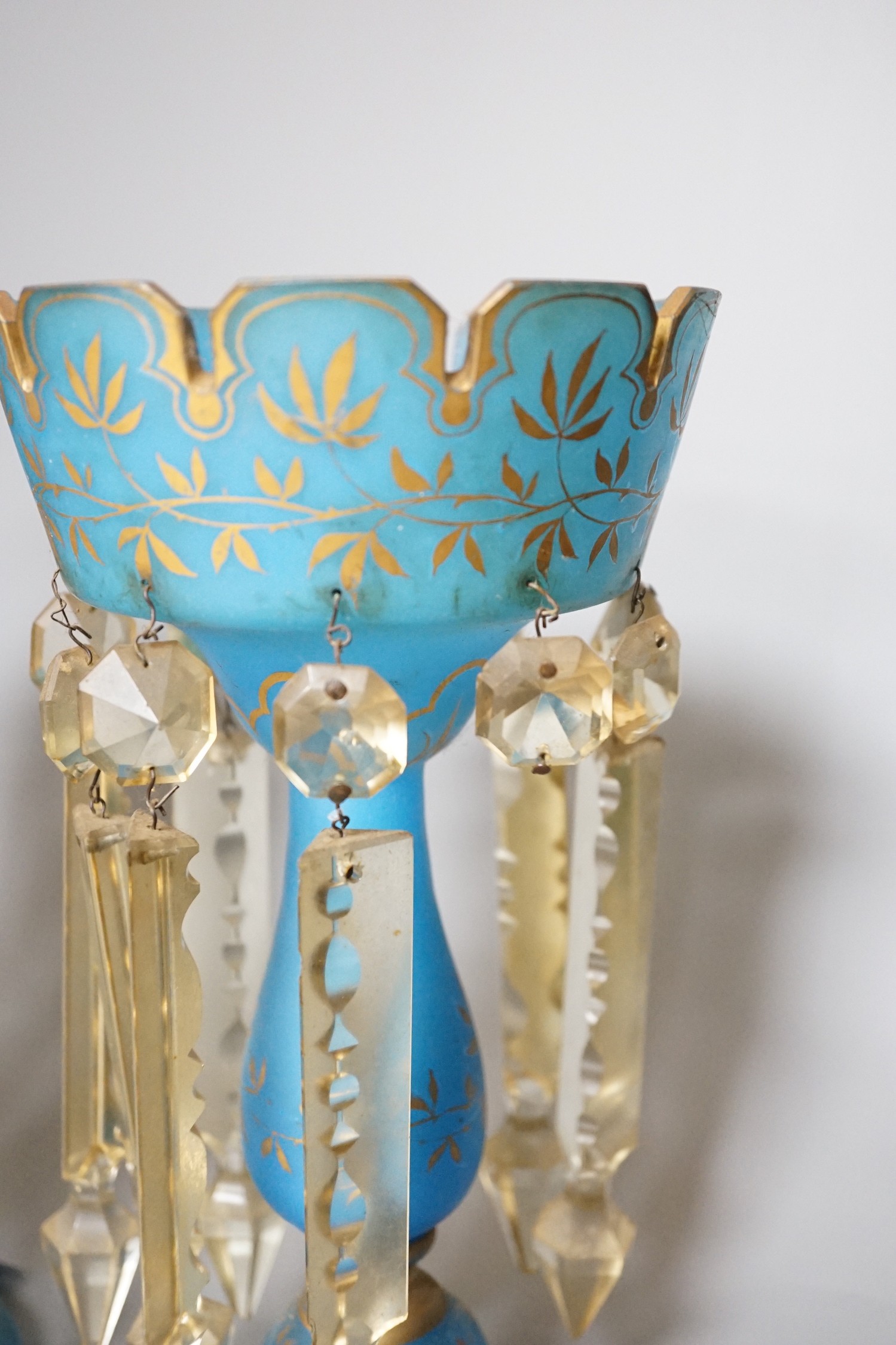 A pair of 19th century turquoise glass table lustres, 27.5cm